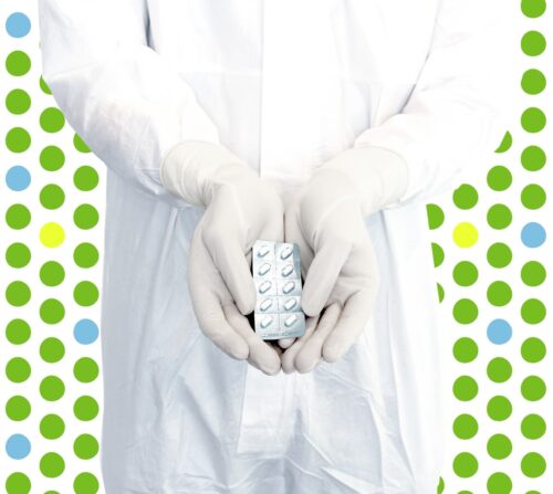 Cleanroom Gloves holding medication on a decorative background